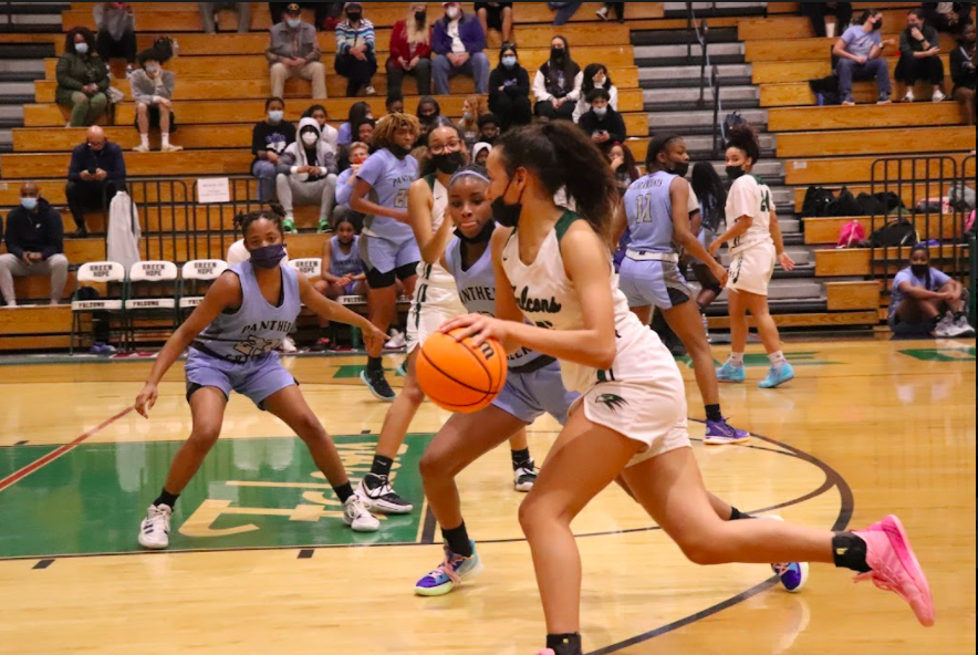Freshman Abigail Brown pictured playing offense against Panther Creek.