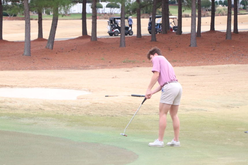Senior Nick Kleu practicing putting at Green Hopes home course, Prestonwood Country Club.