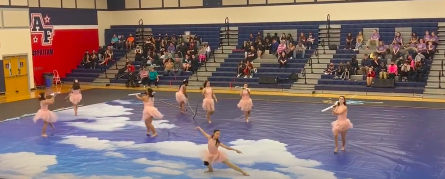Color Guard competing at Apex Friendship in March 2022. 