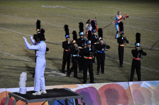 Band members must play while both marching and watching the conductor. 