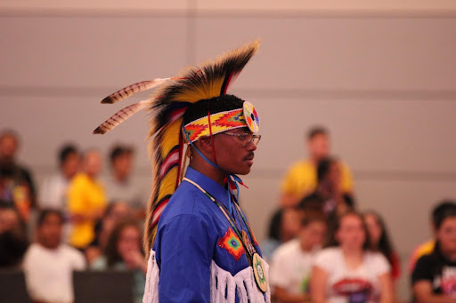 Men’s Cherokee grass dancer, Lawrence Kee, performs a traditional dance at NCNAYO Conference