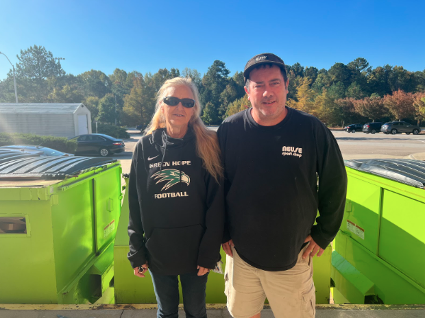 Green Hope High School custodians, Ms. Holt and Mr. Murdoch, who help improve the school environment (not pictured: Mr. Kent). 