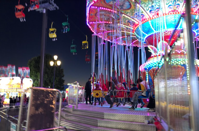 Popular attractions include carousel rides, the ferris wheel, and rollercoaster experiences.