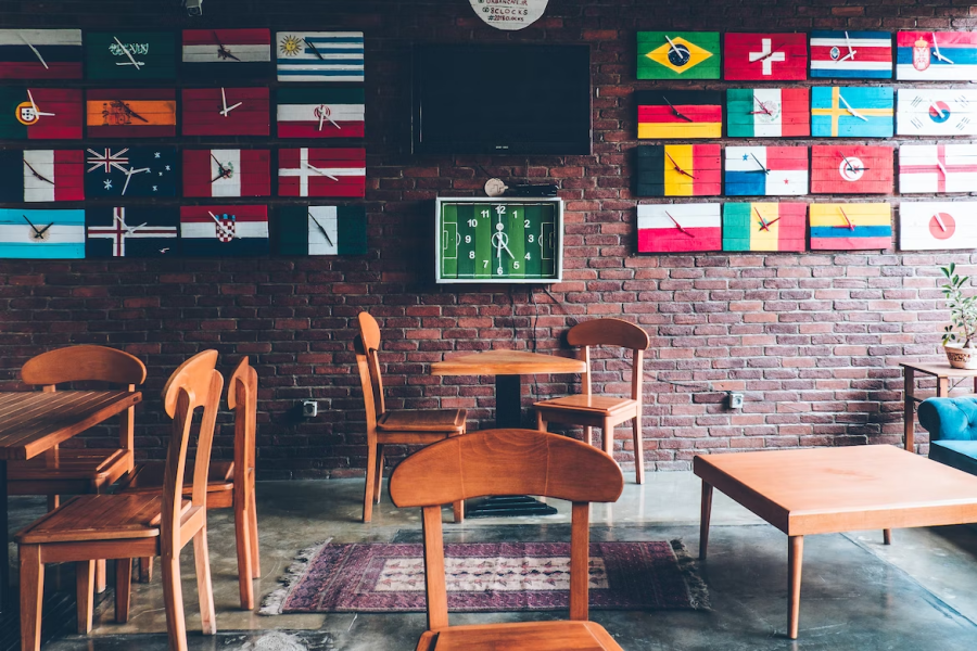 The World Cup teams each have a flag posted on the wall.