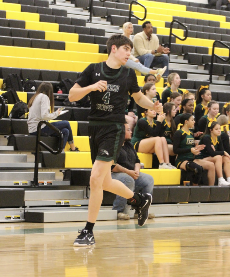 Mason Dean takes the court at a home games against the Apex Cougars.