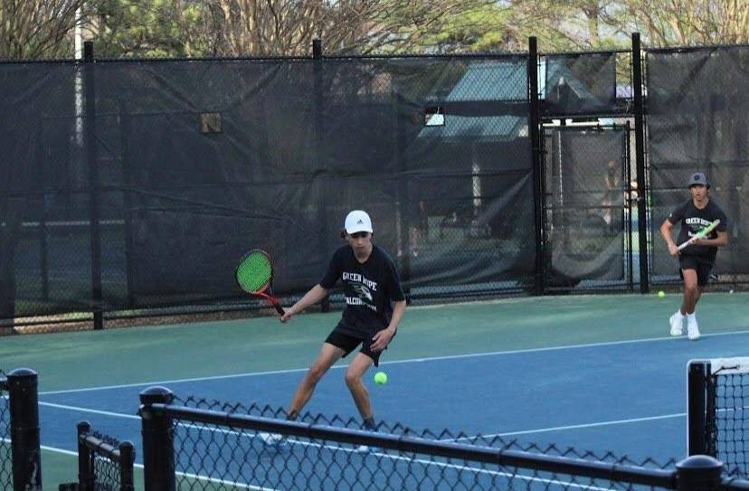 Gervase (27) playing doubles for Green Hope.