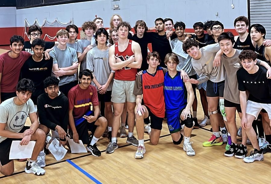 The+Mens+teams+of+Apex+Friendship+and+Green+Level+pose+together+after+their+scrimmage.