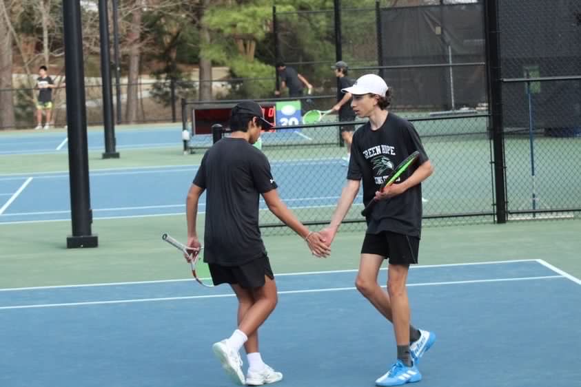 A successful doubles match with Aidan Xu (25) and Stephen Gervase (26).