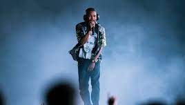 Frank Ocean performing on stage at Coachella in 2023 following a seven year hiatus.