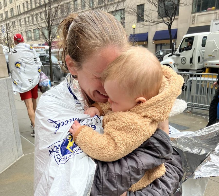 Moakley hugs her daughter after completing the Boston Marathon with a finishing time of 3 hours, 41 minutes and 23 seconds.