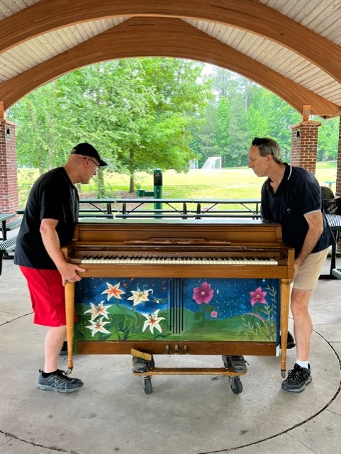 Green Hope’s functional Painted Piano “Singing Lillies” at Green Hope Elementary Park until the winter months (Susan Alexander)