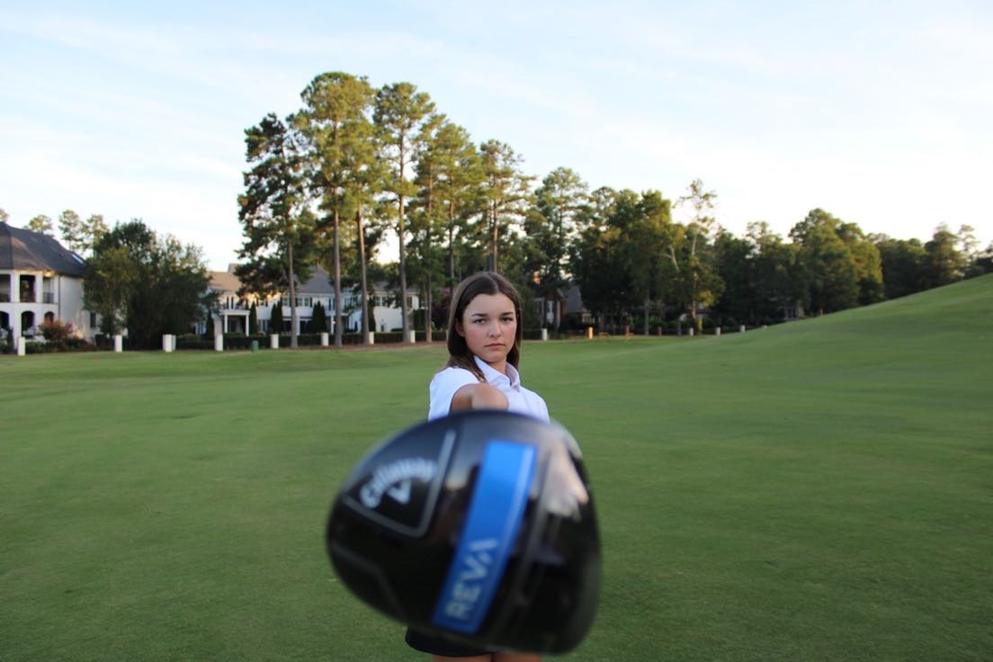 Marlo Arndts loves getting new clubs and gear, including one of her most important clubs, her driver. Photo used with permission from Jim Arndts.
