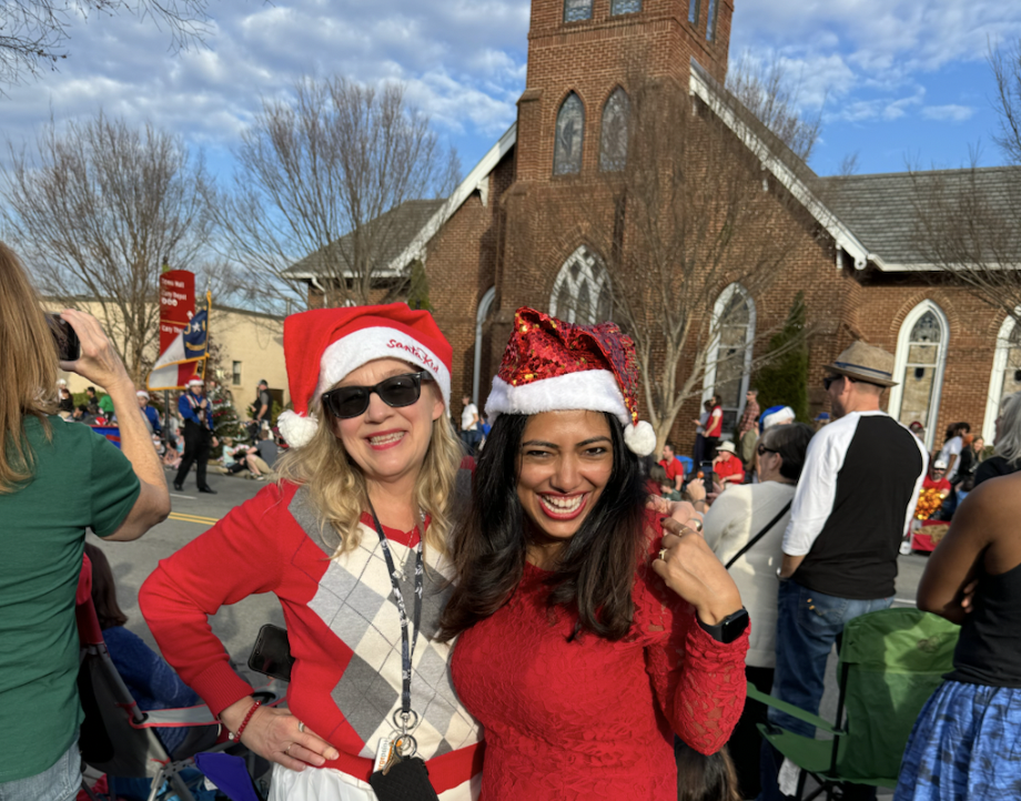 These two best friends enjoyed the parade with their family and dressed festively to match the atmosphere.