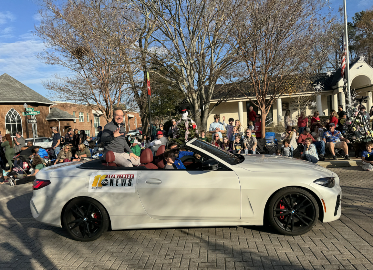 Steve Daniels from ABC11 Eyewitness News participated in the parade while driving a BMW.
