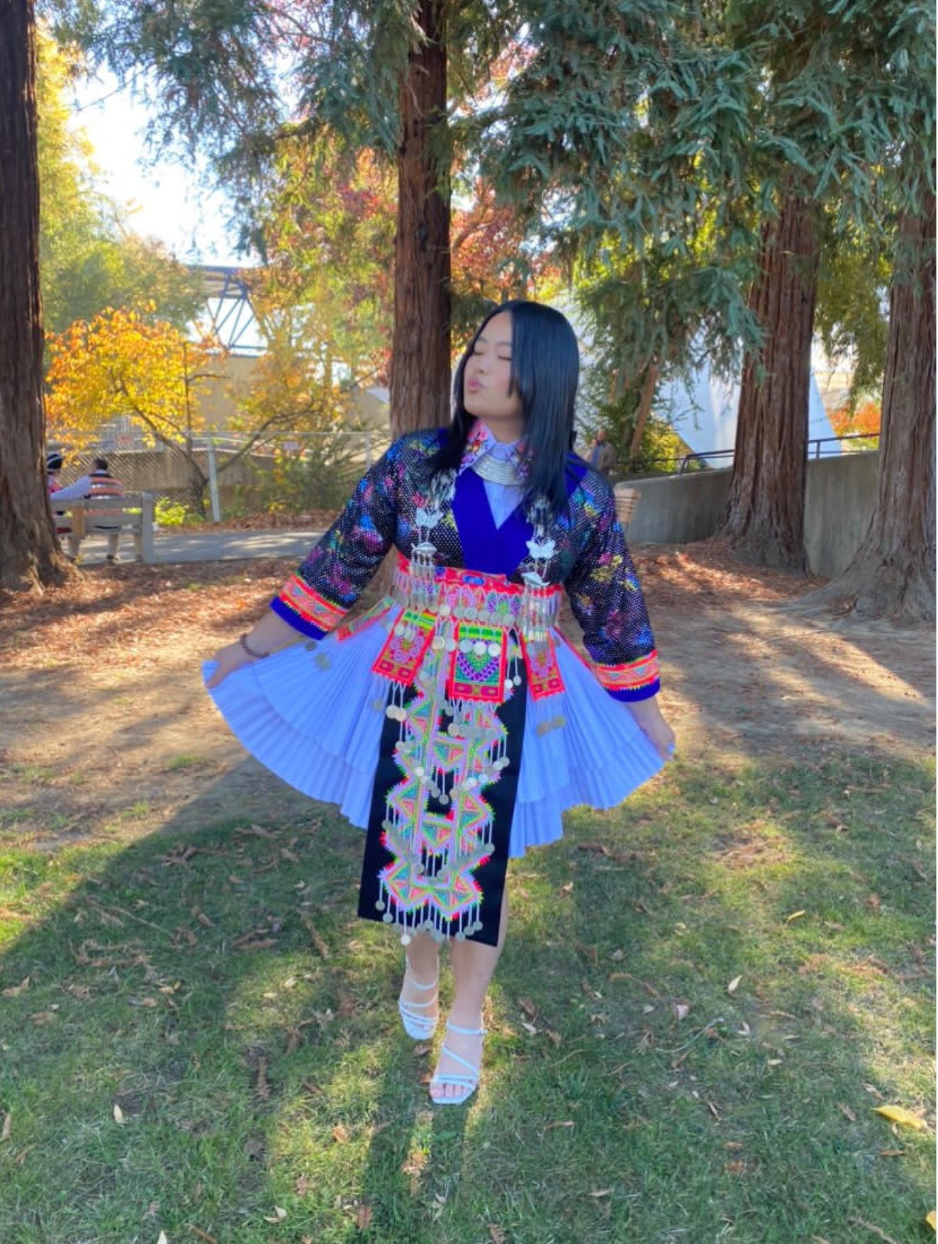 Traditional Hmong attire is often composed of varying bright colors and unique patterns. Photo used with permission from Amy Xiong.
