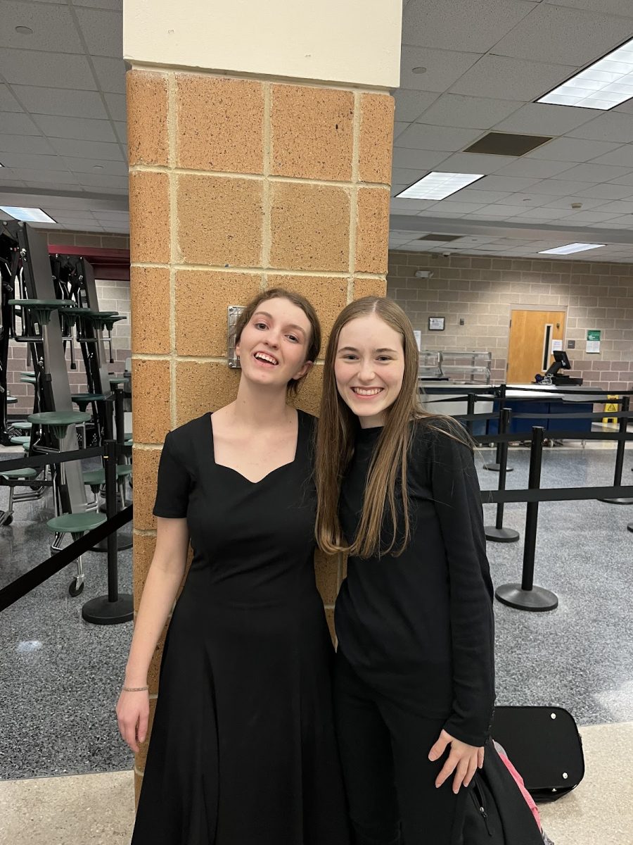 Shannon Williams (‘24) and Allison Sims (‘24) smile together after the chorus and orchestra winter concert in December. Photo used with permission from Shannon Williams.