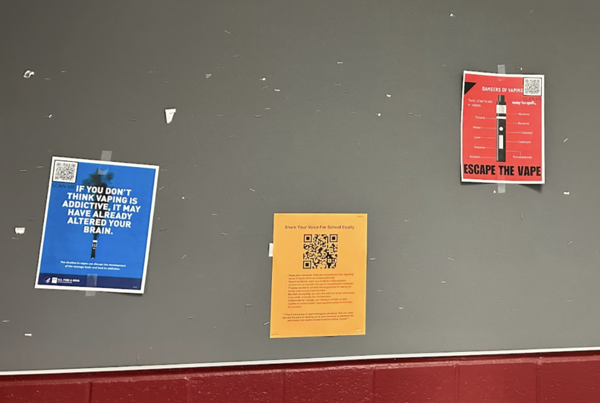 In the 200s hallway in Green Hope High School, many anti-vaping posters are hung up on display for students to see while passing through. 