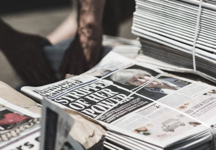Journalism is expensive – and prices run beyond just paying for printed copies of your paper. Photo used with permission from Thomas Charters via Unsplash.