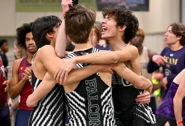 The relay celebrates their championship win, becoming top-10 in the country. Photo used with permission from Dax Mahone.