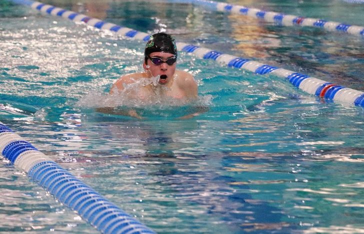 Jaxton Ravenel (‘26) swam the 100-yard breaststroke throughout the season, consistently earning the swim team points from the event. Photo taken with permission by Gloria Xiang (‘24).
