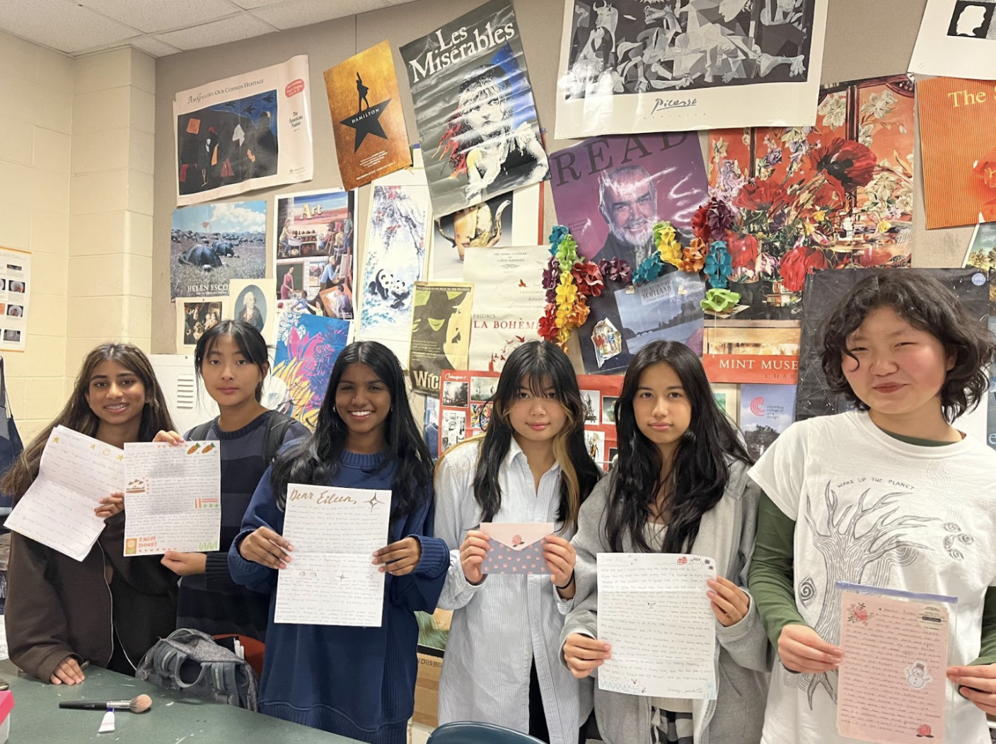 A group of Green Hope students pose with their personalized letters at a Letters for Rose meeting. Letters are often written to seniors in elderly homes, and writers have the option of maintaining further correspondence with recipients. Photo used with permission from Emilee Yoo (25). 