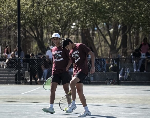 Brij Bhatt (‘25) and Aidan Xu (‘25) heading off the court after a fierce doubles matchup. Photo used with permission from Rafik Khismatov (24).
