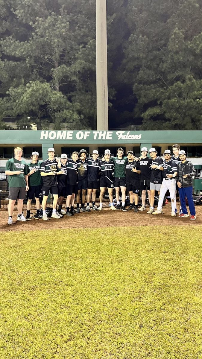 Team photo of the men’s varsity baseball team after a tough game against Cary High, ultimately winning with the final score of 12-10. Photo taken with permission from Roshan Shoukat (25).