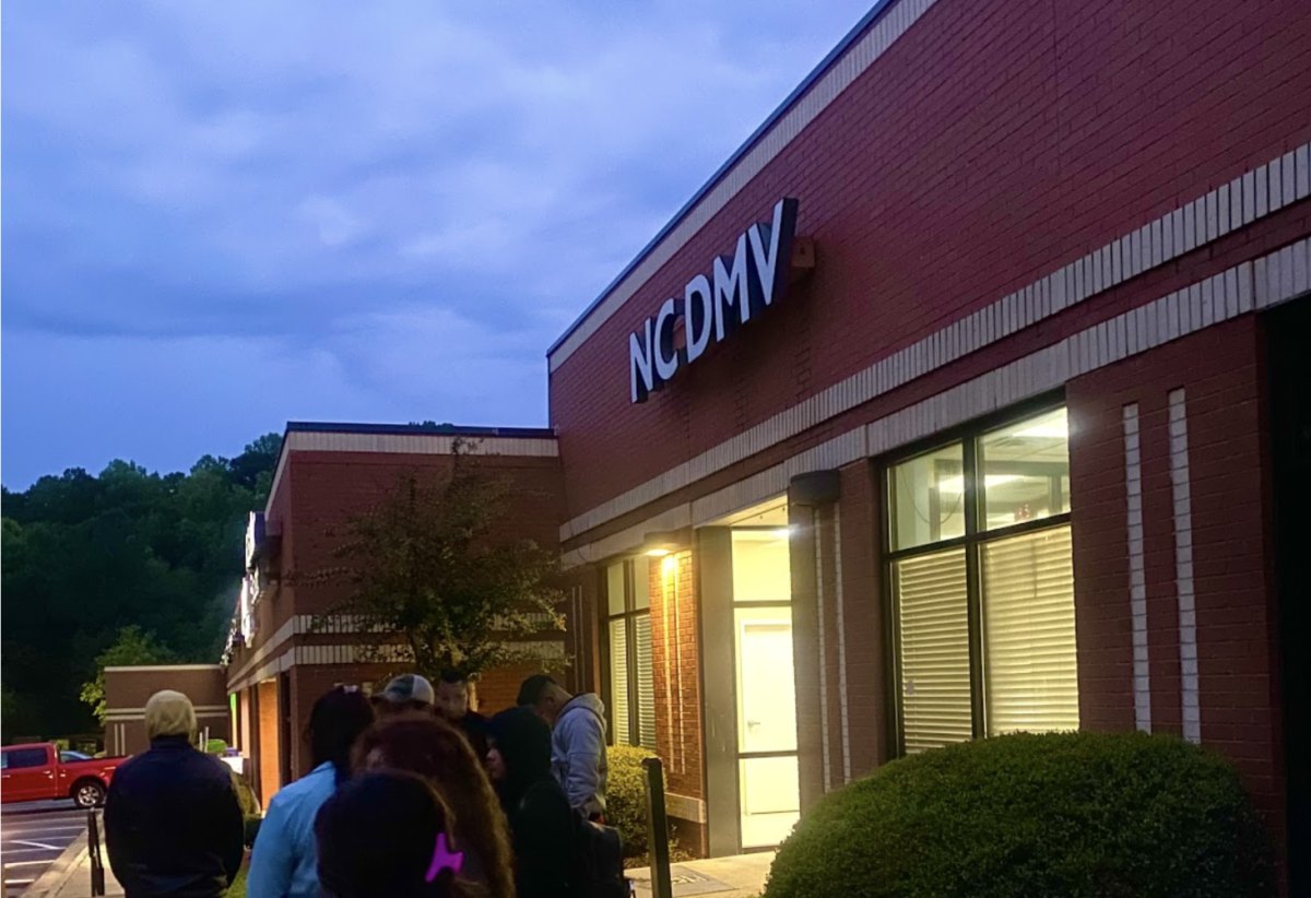 At around 5:40 a.m. on a foggy Monday morning, a line of around 20 people already formed outside a Wake County DMV. Well before the office's hours would start, some people in line prepared foldable lawn chairs to wait outside.