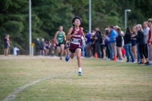 Nathan Vo ('28) is the fastest freshman in Green Hope's storied history. His current PR is 16:08. Photo used with permission from Dan Loughlin