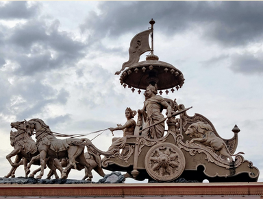 A depiction of an ancient chariot from Mahabharata with carving and motifs. Photo used with permission from Anshuman Abhishek via Unsplash.