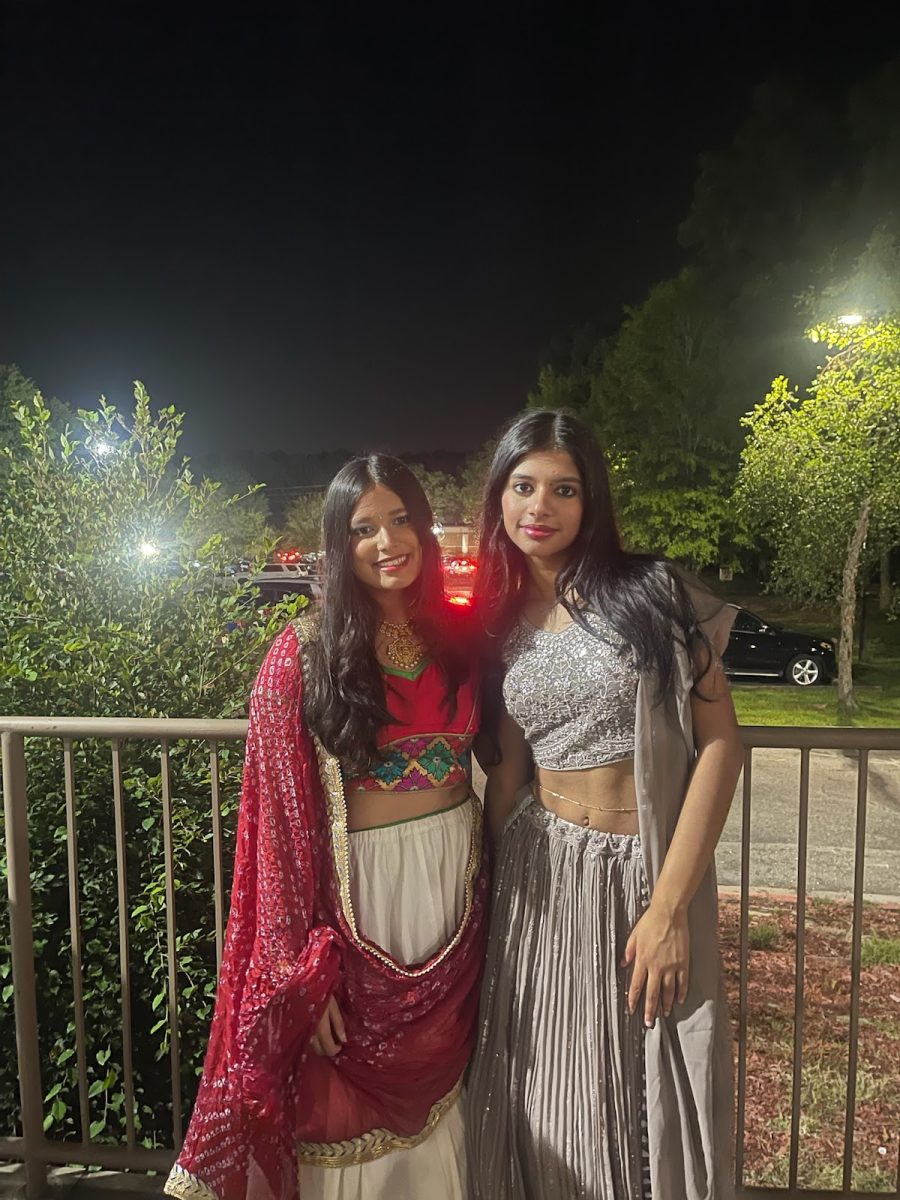 Aditi Bhadauria ('25) and Amrita Abhilash ('25) getting ready to enter the Garba Hall.