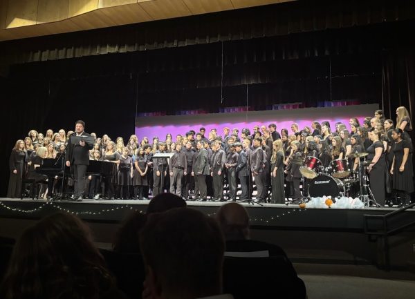 Chorus Director Mr. Allen Botwick speaks before the Chorus performs their last three songs.