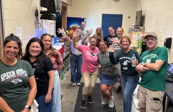 Booster club faculty members work in the concession stand during home football games.