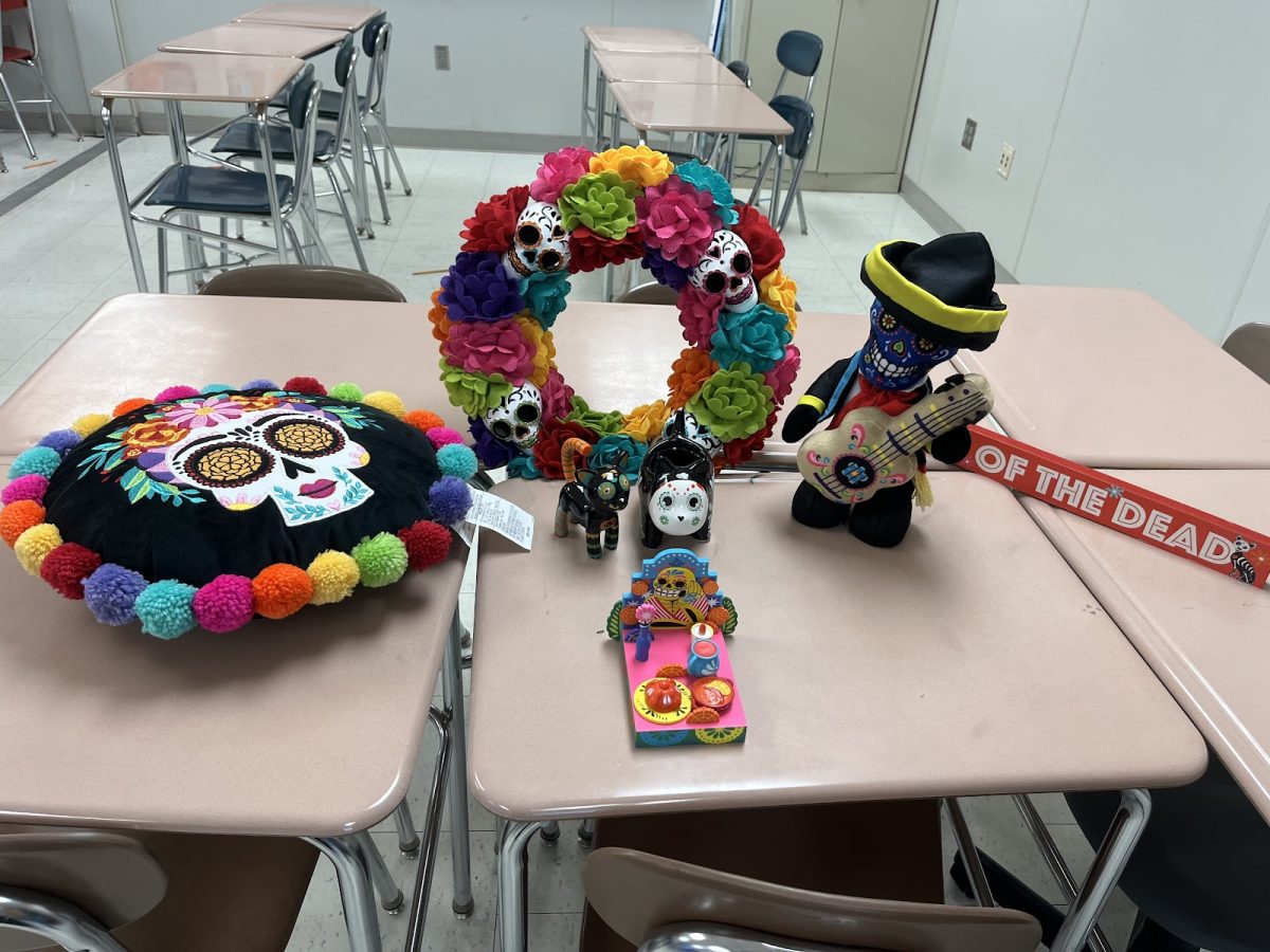 Mrs. Perdomo displays her Day of the Dead decorations.