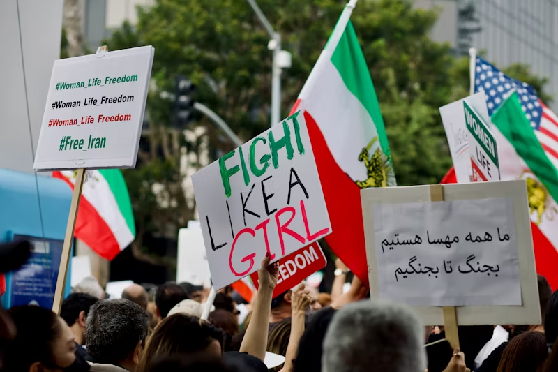 A group of people protesting for gender equality in Iran. Photo used with permission from Craig Melville via Unsplash