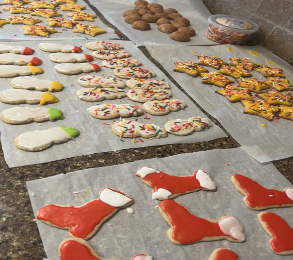 Christmas cookies are fun for the family and can be made into different shapes such as stockings, snowmen and gingerbread men.
