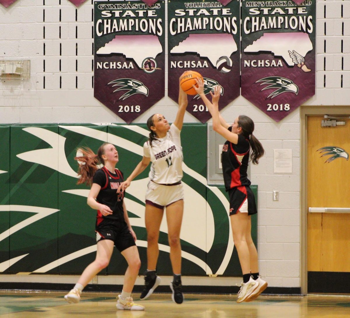 Abigail Brown ('25) rejects a shot from a Middle Creek guard. She is averaging 1.4 blocks per game.