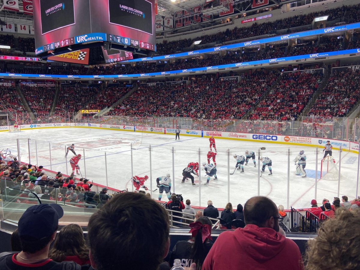 The Carolina Hurricanes battling at the faceoff dot in the offensive zone. 
This past Friday the Carolina Hurricanes made a blockbuster deal to acquire forwards Mikko Rantanen and Taylor Hall in a three team deal.


