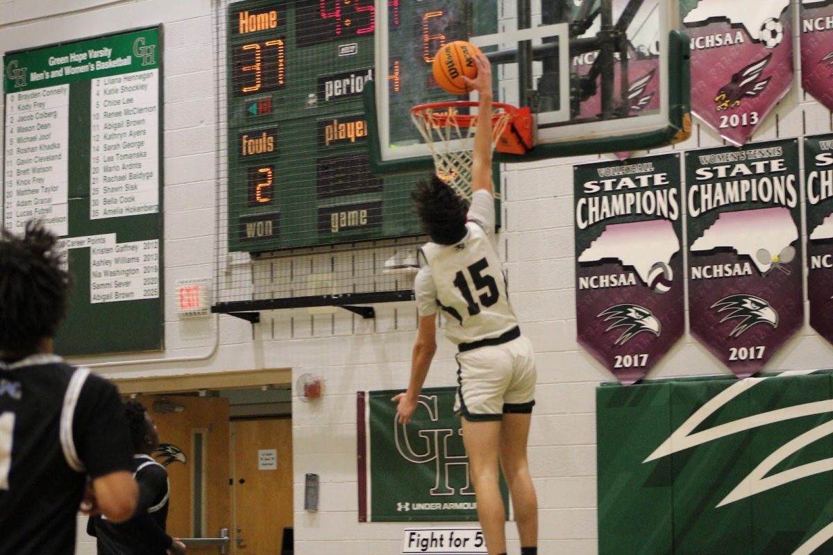 Knox Frey ('28) dunks the basketball on a fast break. He is averaging 14.4 points per game