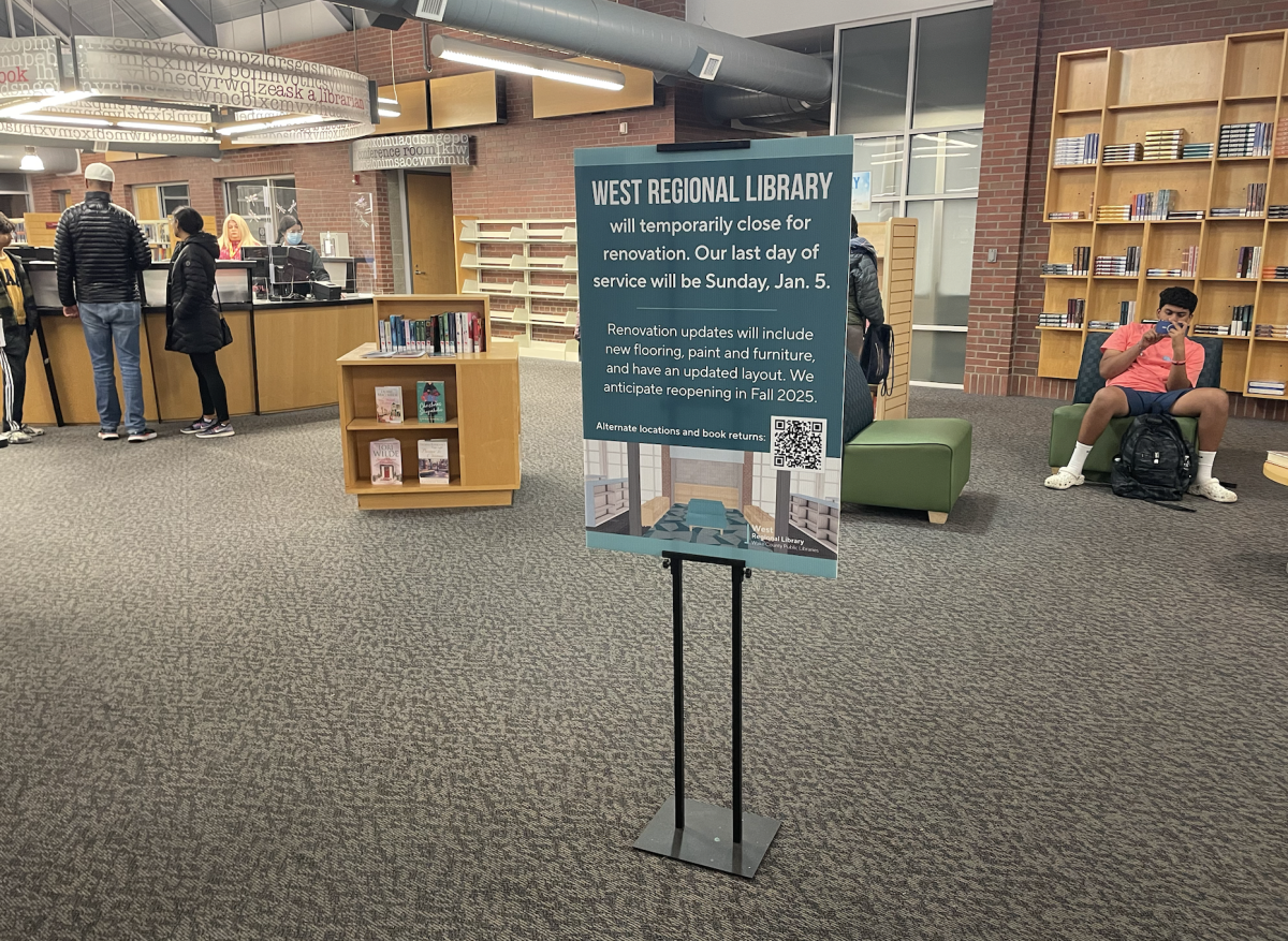 A sign that announces the temporary closing of West Regional Library's building, one of many ways that library staff are informing visitors of the incoming renovations. 