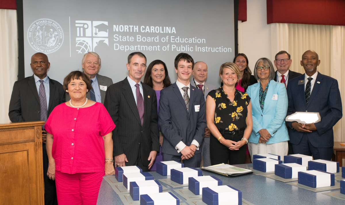 A group photo of the board, including Ian House, other members, advisors, and the NC Superintendent. Photo taken with permission from Ian House.