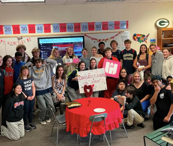 Ms. Jensen, accompanied by her students and members of PEPI, poses for a picture celebrating the Wake County Employee Excellence Award. Photo used with permission from Ms. Danielle Jensen. 