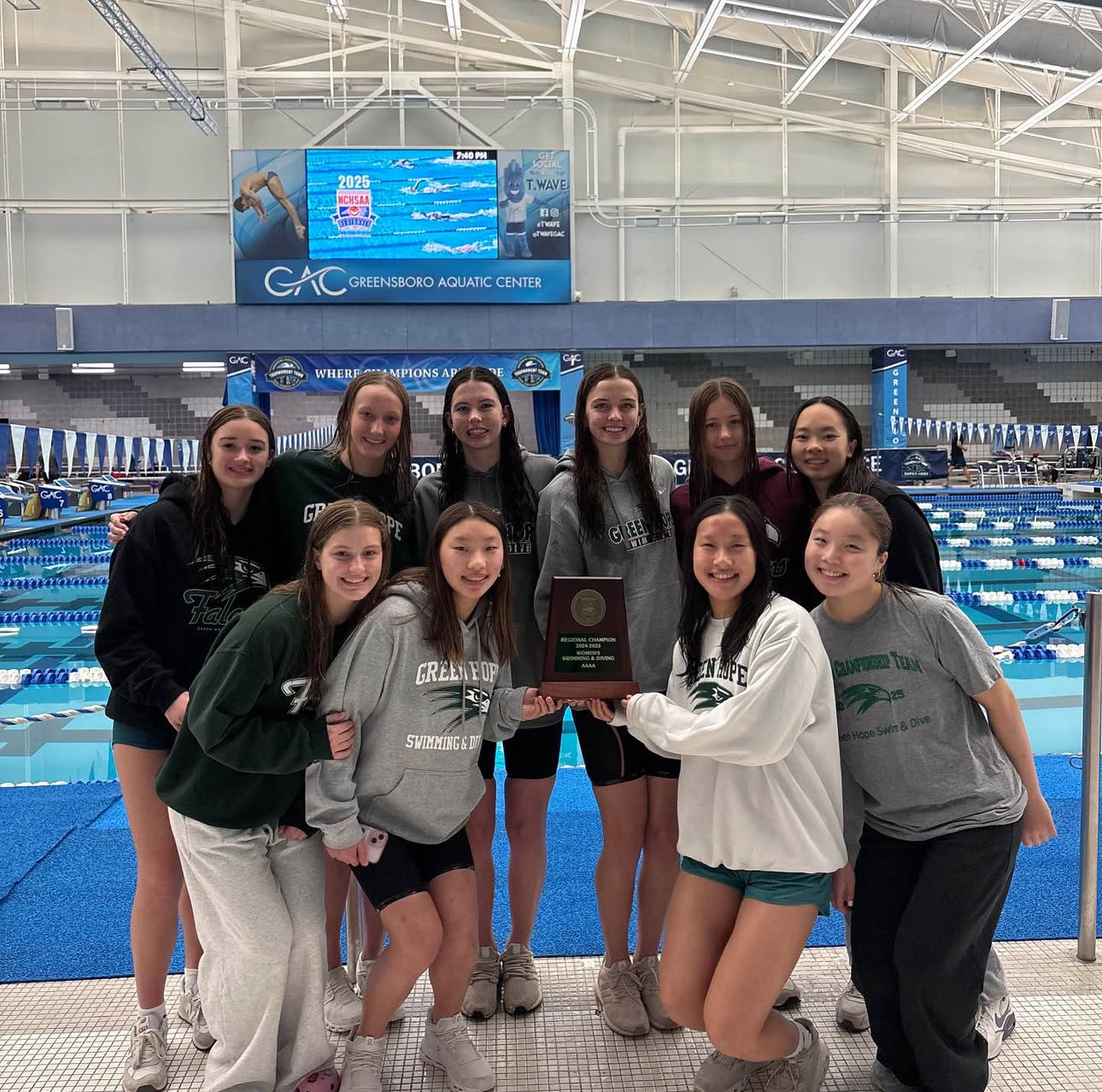 The team smiles after winning the NCHSAA 4A Central Regional Championship. Photo used with permission from Angelina Lu.