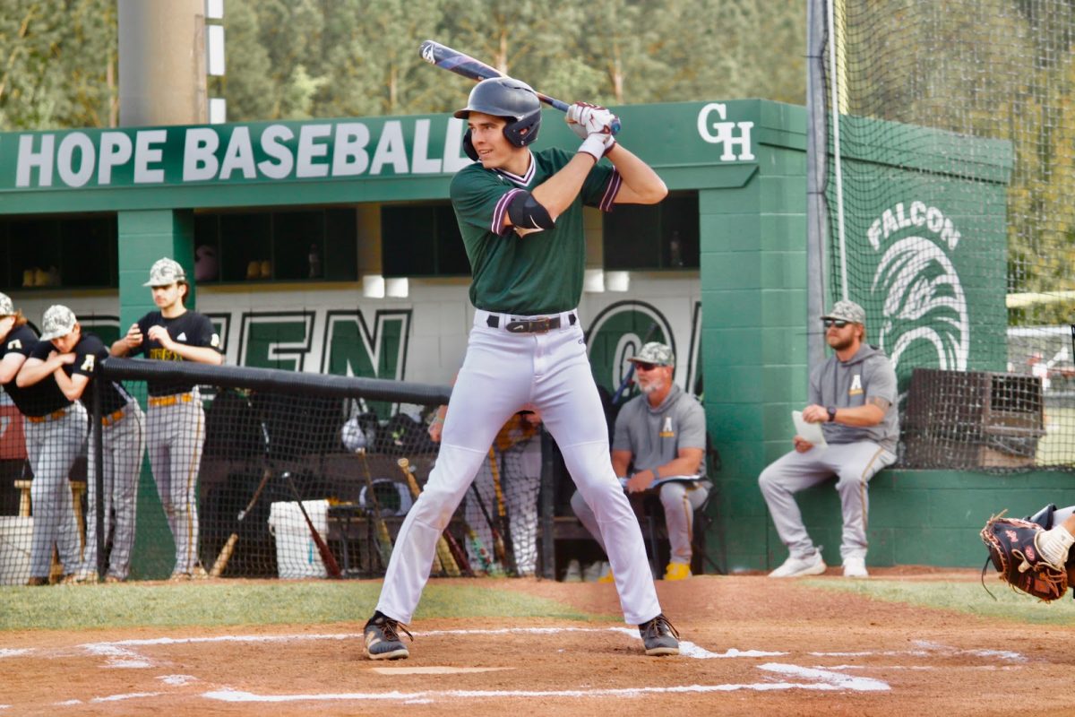 Dean steps up to the plate during an intense game against Apex High School a conference rival. Photo used with permission from Harris Seifert.