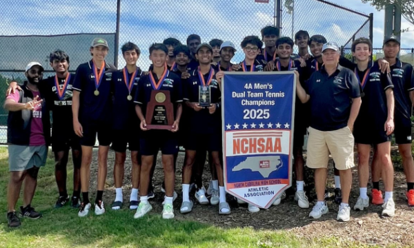 The tennis team stands together after their victory at the state tournament. Photo used with permission from @ghhsmtennis on Instagram.
