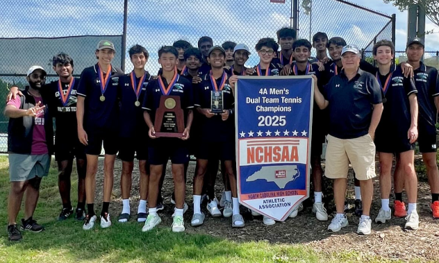 The tennis team stands together after their victory at the state tournament. Photo used with permission from @ghhsmtennis on Instagram.