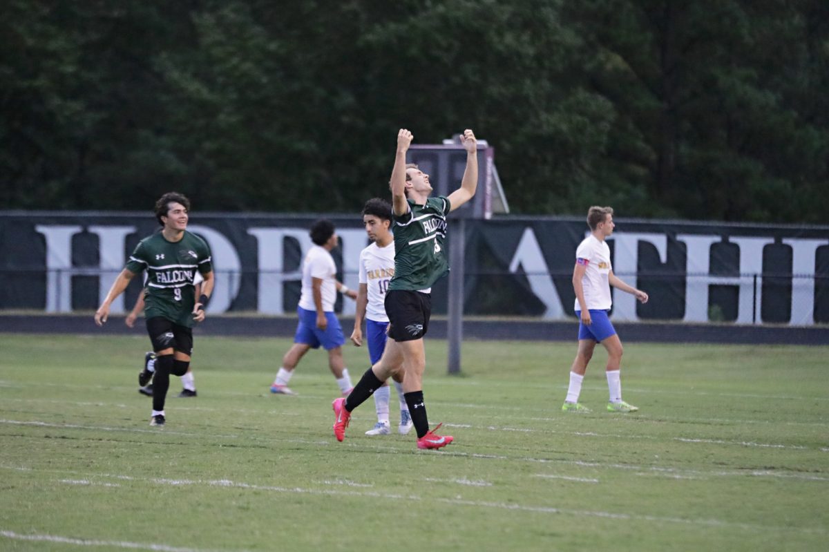 Carter Emanuelson (‘26) celebrates his first goal of the season in a decisive 5-2 victory over East Wake High School. Photo used with permission from Gabby Fekete.