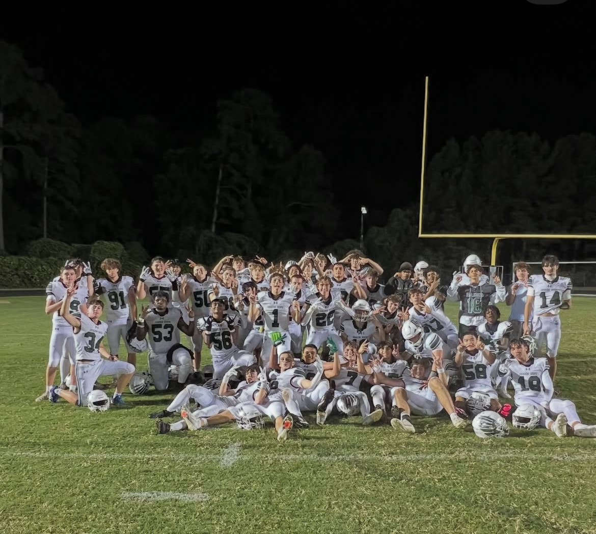 The Falcons pose for a photo after a decisive 52-0 victory over Ravenscroft. Photo used with permission from @ghfalconsfootball on Instagram.