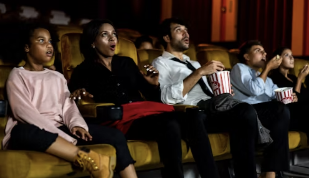 Moviegoers suspended in total shock viewing horror movies: Used courtesy of Getty Images from Unsplash.