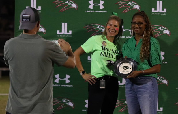Blake Watson’s mother received Watson’s plaque since he could not attend the recognition ceremony himself. Photo used with permission from Riley Boyer.